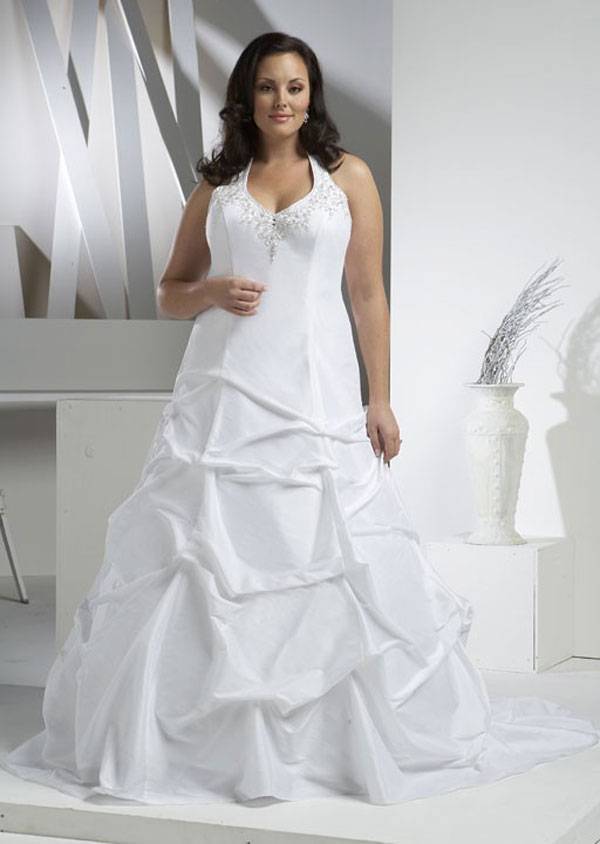 Свадебные платья для полных: как подчеркнуть достоинства фигуры